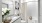 model bathroom with white cabinets and tub